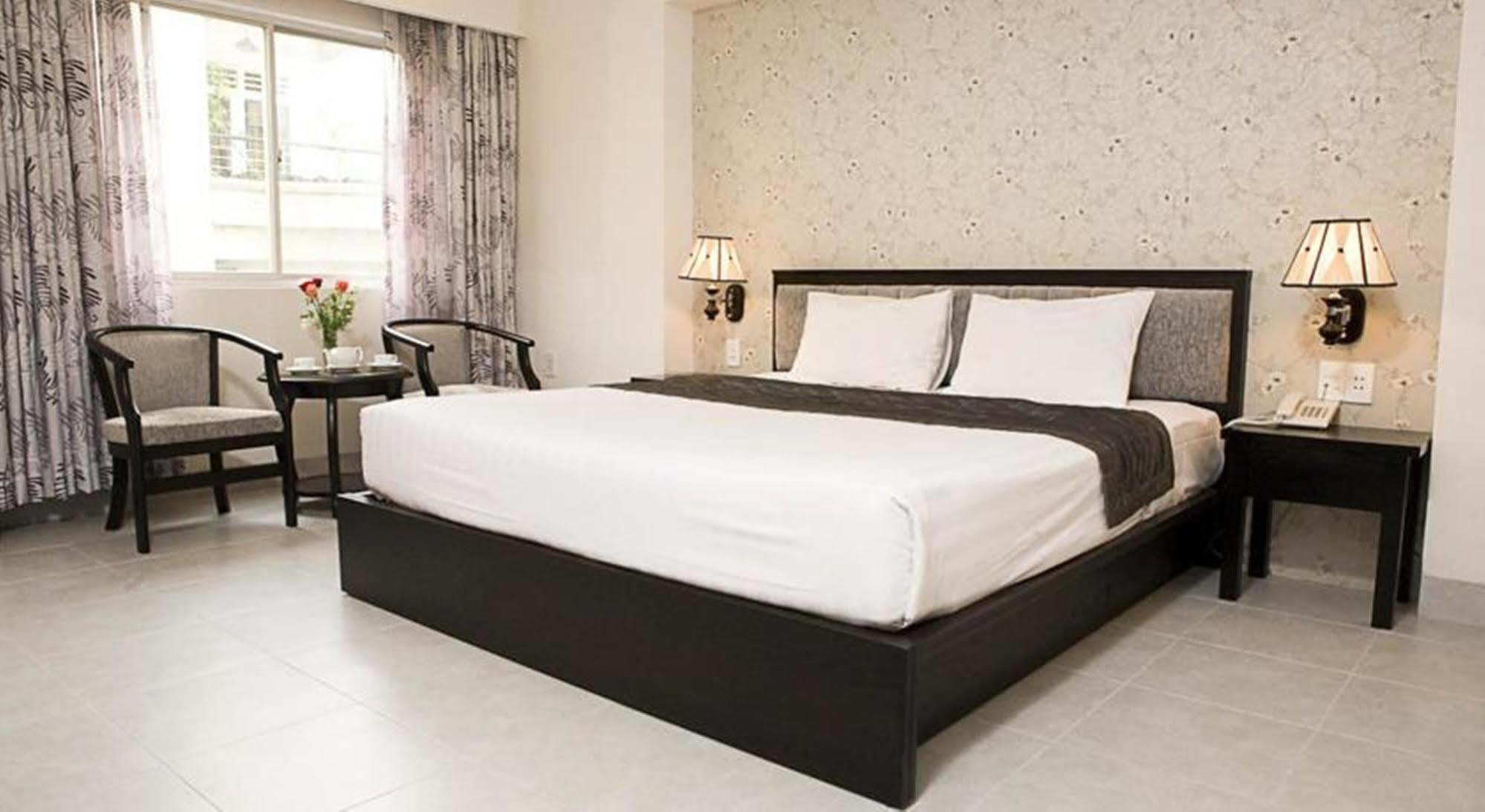 Hoang Vinh Hotel Хошимин Экстерьер фото